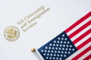 Citizenship documents for immigrants with a united states flag on the side