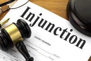 how do you take out an injunction